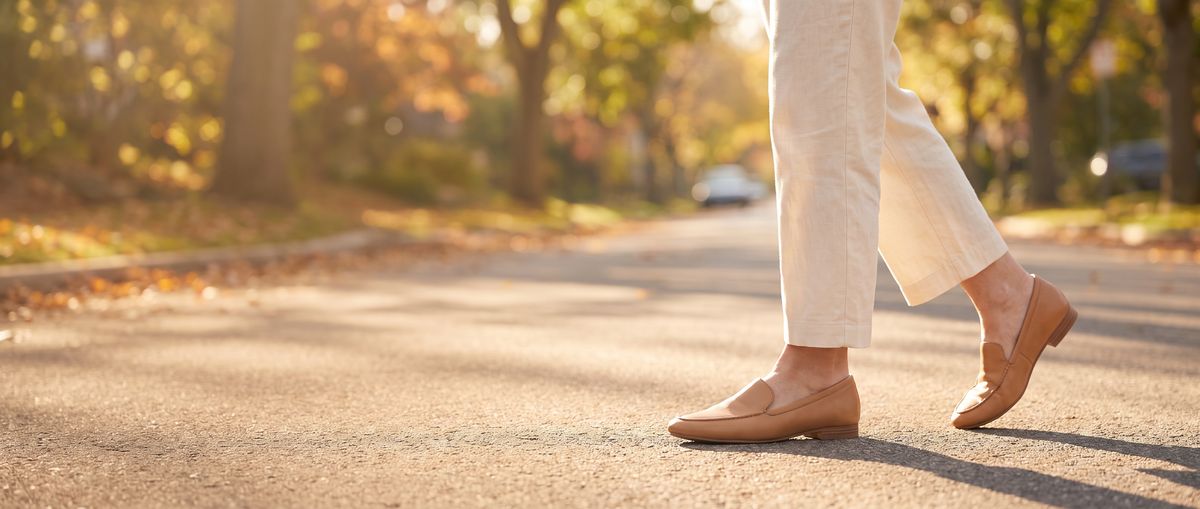 Walking in everyday loafers on a sunny autumn street